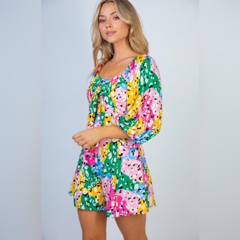 NEW Multi colored romper with boat neck & puff sleeves